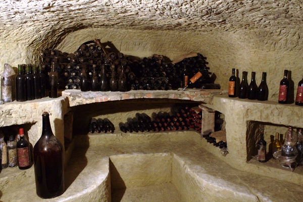 What to see in Rosignano Monferrato - Infernot church of the Madonna delle Grazie - bottles of wine - stone from cantoni