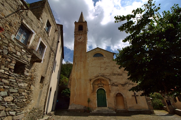 What to see in Castelvecchio di Rocca Barbena - church of our lady of the Assumption - bell tower - portal - frescoes