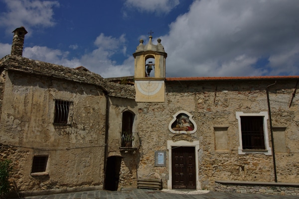 What to see in Castelvecchio di Rocca Barbena - oratory of Santa Maria Maddalena - frescoed lunette - bell tower